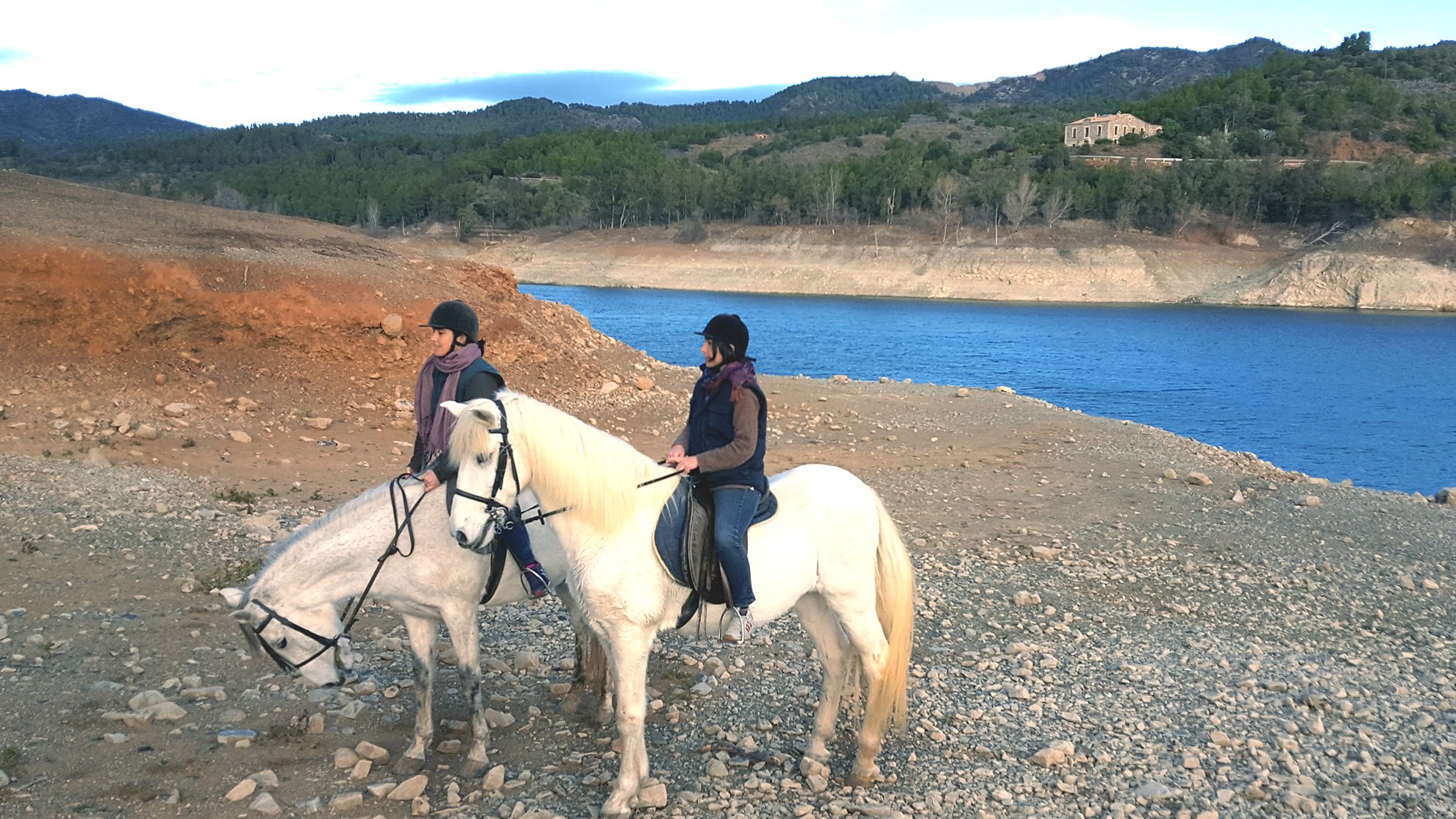 Horseriding excursion to the lake of Riudecanyes, Casa Vella in the background